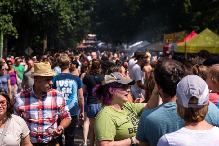 Festival goers crowd the walkway during the International Institute's 2019 Festival of Nations at Tower Grove Park in St. Louis Saturday, Aug. 24, 2019. Organizers said this was the 19th annual festival of multicultural sights and sounds of the St. Louis region. Photo by Sid Hastings