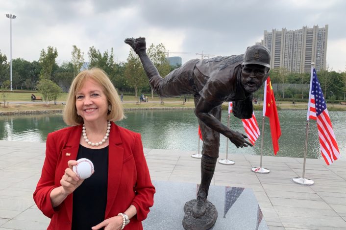 Mayor Lyda Krewson gifts bronze statue of Cardinals player Adam Wainwright to St. Louis sister city Nanjing, China.