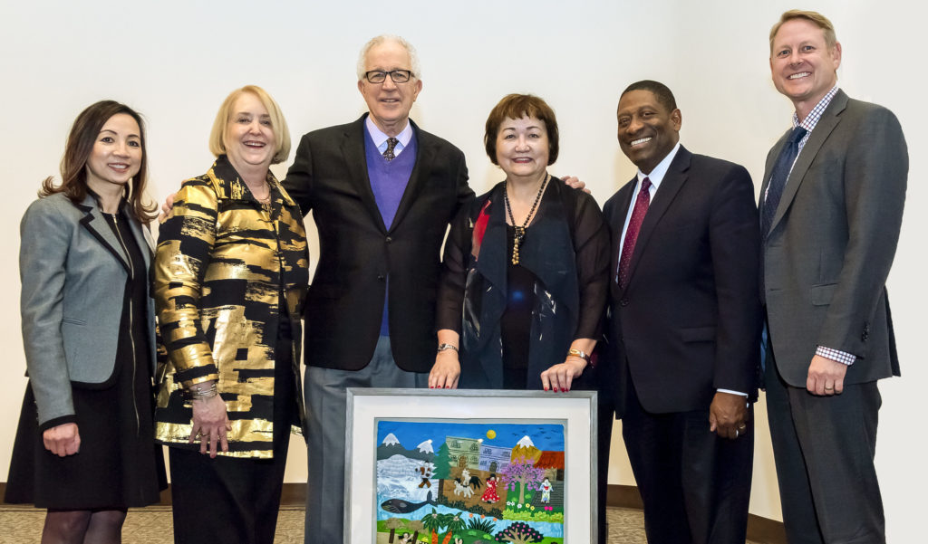 Supporters and staff of the International Institute St. Louis gathered to celebrate the 100th anniversary of the institute at the group's campus in St. Louis Thursday, Nov. 14, 2019.