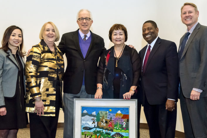 Supporters and staff of the International Institute St. Louis gathered to celebrate the 100th anniversary of the institute at the group's campus in St. Louis Thursday, Nov. 14, 2019.